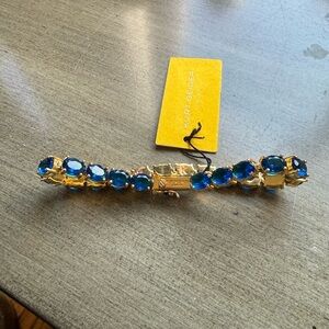Kurt Geiger Gold Bracelet with Blue Stones